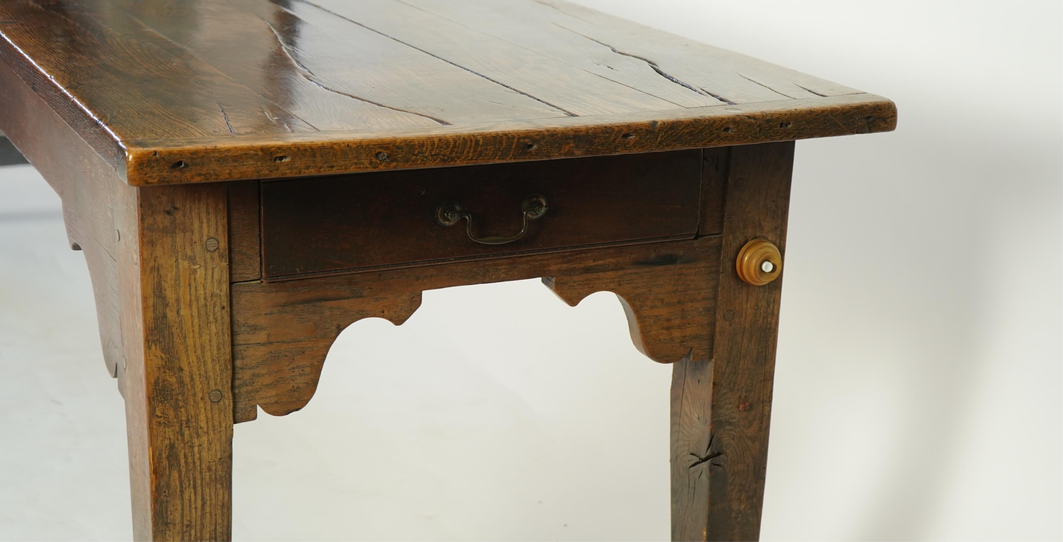 A 19th century rectangular oak refectory dining table